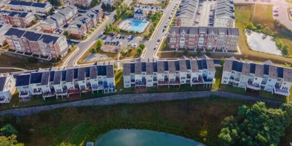 Sunrise.Top-down aerial view of urban houses and streets in a residential area of Ashburn. Virginia, USA